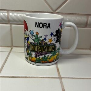 Vintage Universal Studios Florida NORA Character Mug